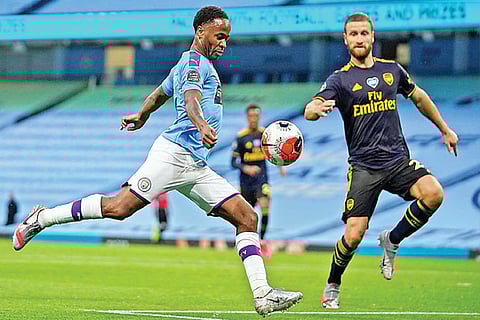 Raheem Sterling (left) broke the deadlock for Manchester City