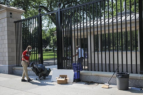 White House scales back practice of taking temperatures of visitors