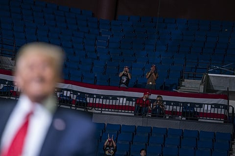 President Donald Trump supporters cheer as Trump speaks during a campaign rally at the BOK Center