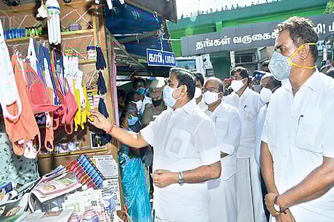 Chief Minister accompanied by Local Administration Minister and officials, inspecting masks