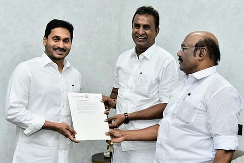 Ministers S P Velumani and D Jayakumar handing over the letter to Andhra CM at Vijayawada on Wednesday