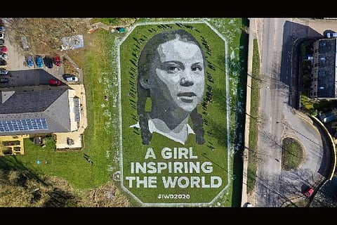 Giant Greta Thunberg portrait unveiled in England