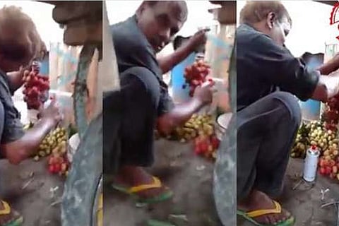 Video of spray painted fruits, not from India