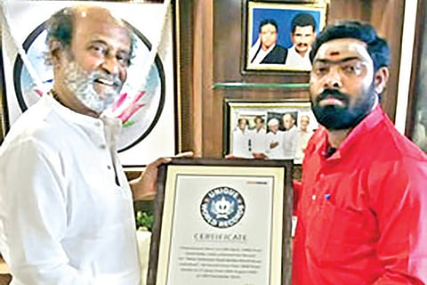 Rajinikanth honouring Manimaran