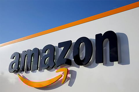 Amazon raises overtime pay for warehouse workers