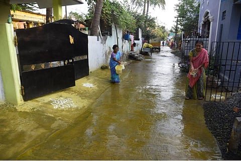 Mudichur residents sprinkle turmeric water to maintain cleanliness