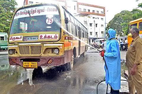 TNSTC bus being given a wash in Coimbatore on Monday