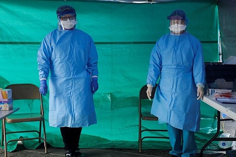 'We're trying to keep our heads above water': U.S. healthcare workers fight shortages - and fear