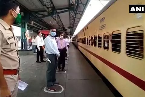TN workers stuck in Maharashtra reach Trichy by special train