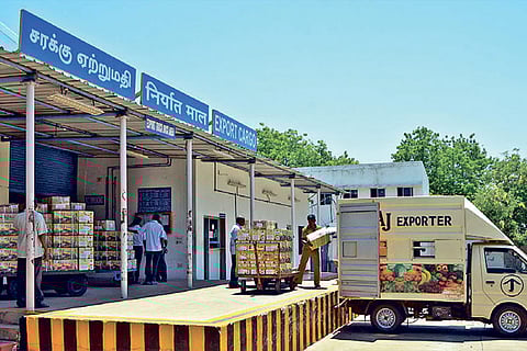 Cargo being loaded into a van at Tiruchy Airport