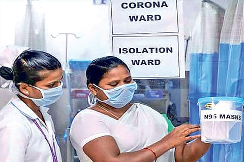 Healthcare workers at a hospital in the city