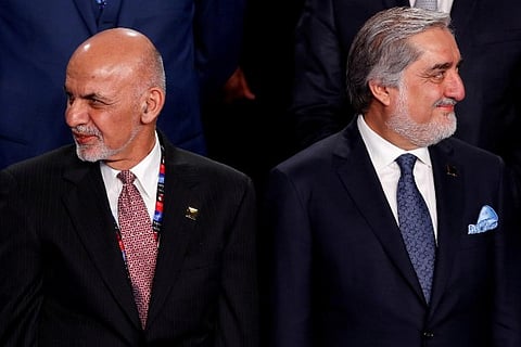 Afghan President Ghani and rival Abdullah sign power-sharing deal