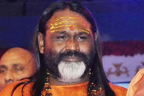 Daati Maharaj conducts pooja at temple amidst lockdown