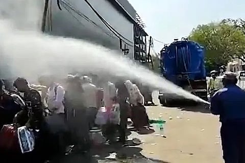 Spraying disinfectant on migrants a criminal act: AAP