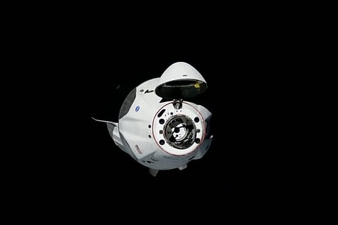SpaceX's astronaut-riding Dragon successfully docks with International Space Station