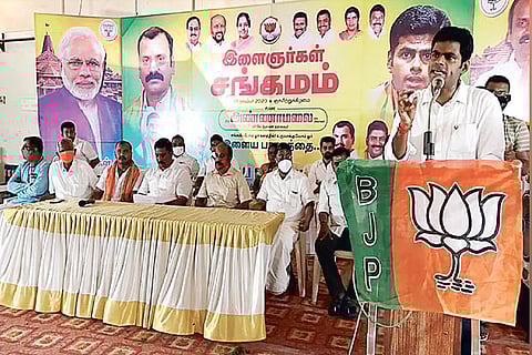 BJP state vice president K Annamalai addressing a party meeting in Tirupur on Sunday