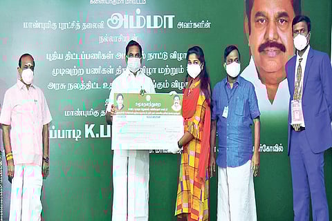 Chief Minister handing over welfare assistance to a beneficiary in Kanniyakumari on Tuesday.