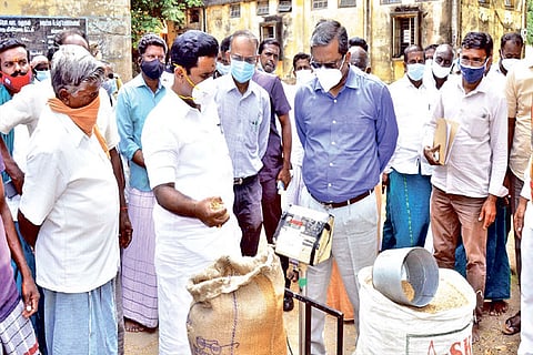 Food Minister R Kamaraj inspecting a DPC in Tiruvarur on Saturday