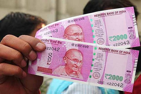 File Photo: currency notes might be potential corona carriers