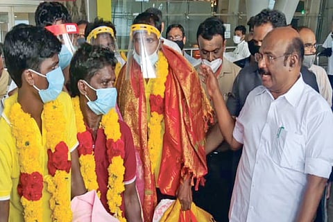 Fisheries Minister D Jayakumar with the rescued fishermen