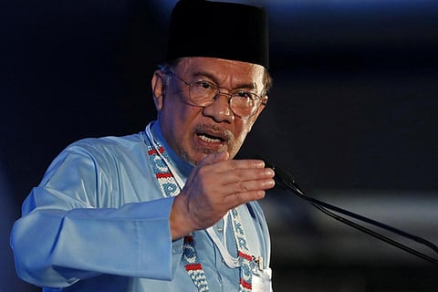 Malaysia's Anwar meets king in bid to form new government