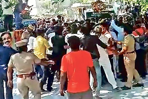 AMMK cadre around the van with Vetrivel?s body