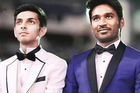Anirudh and Dhanush during an event