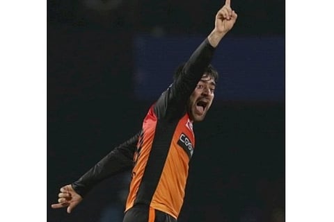 Some fun as Rashid imitates Muralitharan's bowling action