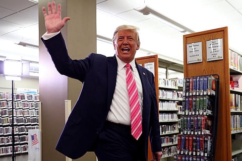 'I voted for a guy named Trump,' says US President after casting his ballot