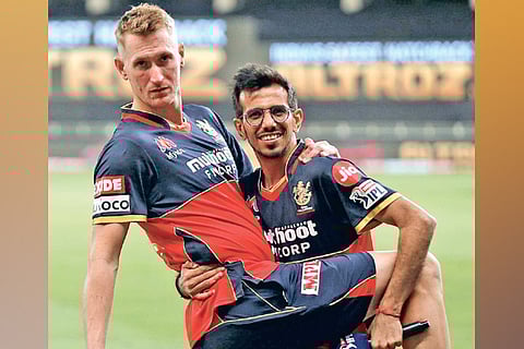 Chris Morris (left) and Yuzvendra Chahal