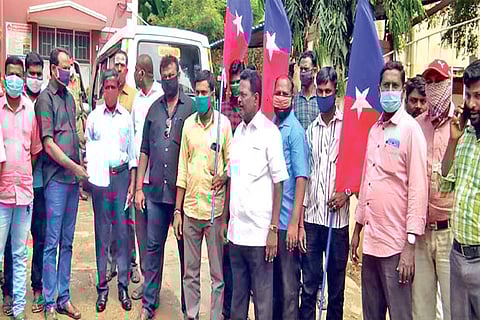 VCK cadre at the Ambur town police station with the petition demanding arrest of the former BJP coun