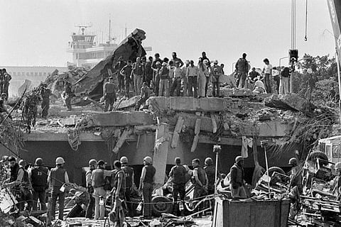 Rescuers continue to probe the wreckage of the U.S. Marine barracks a day after a suicide truck bomb