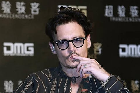 Johnny Depp wants USD50mn trial deferred as it clashes with 'Fantastic Beasts 3' shoot
