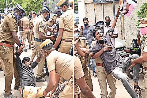 Protesters being rounded up by police personnel on Sunday