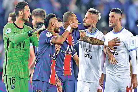 PSG and Marseille players clash during their Ligue 1 match