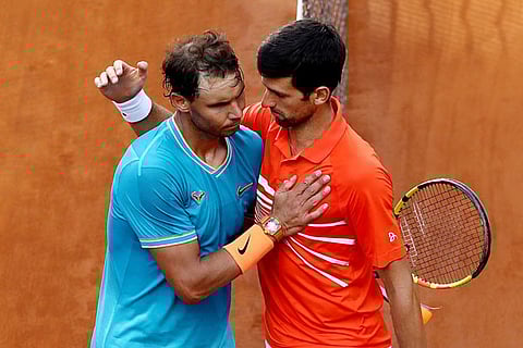 Djokovic, Nadal reach third round of Italian Open
