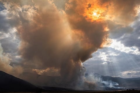 Showers bring relief to fire-ravaged Oregon as death toll rises in California