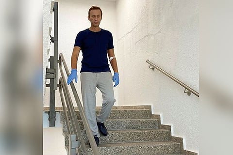 Kremlin critic Navalny posts photo of himself walking