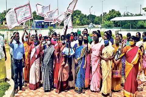 Women self-help group members complain against micro finance firms