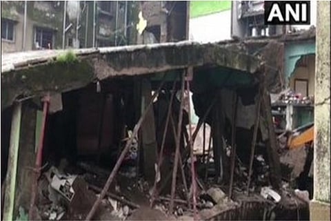 The three-story building collapsed around 3:40 am on Monday