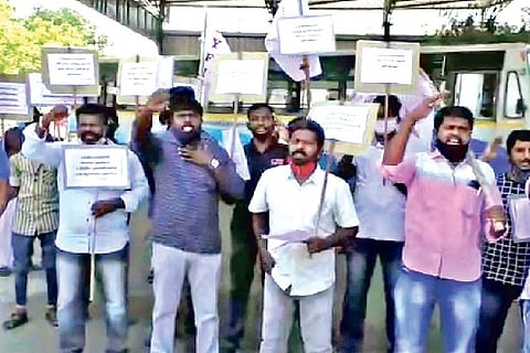 Members of DYFI staging a protest in front of Collector office in Tirupur on Wednesday.