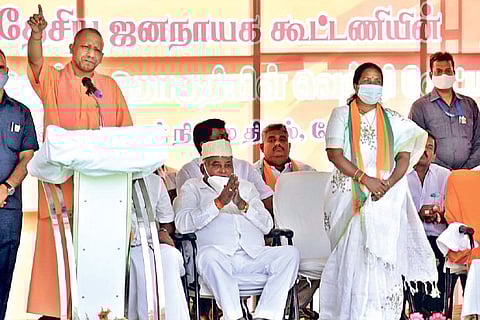Yogi Adityanath and Vanathi Srinivasan during the campaign on Wednesday.