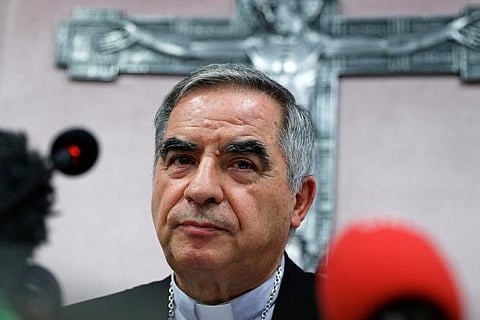 Pope meets cardinal he fired, in apparent reconciliation