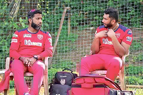 Punjab Kings batting coach Wasim Jaffer (left) with Shahrukh Khan