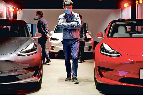 Tesla’s market value slated to gain USD50 billion on record EV deliveries