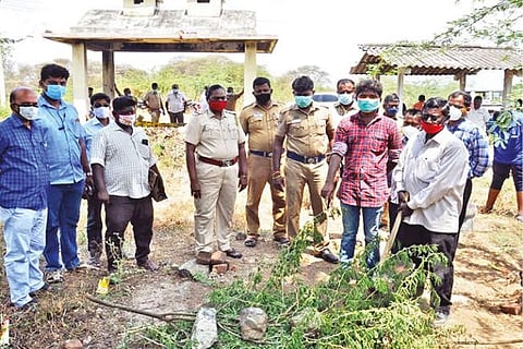 Police examining the spot where the body of the infant was buried in Namakkal on Wednesday