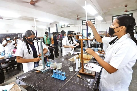 Class 12 students attending practical exam at Government Girls Hr Sec School in Ashok Nagar, Chennai
