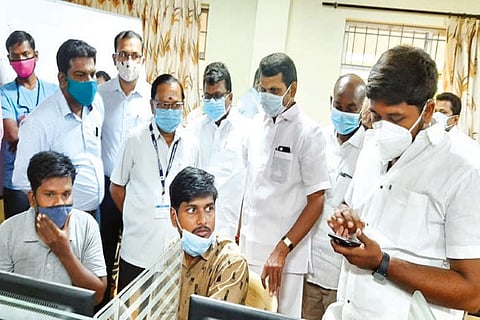 The Karur and Aravakurichi DMK candidates inspecting a room in the presence of Returning Officer