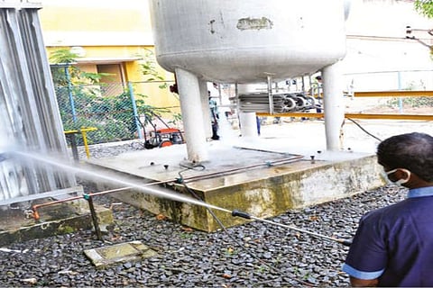 Water being sprayed on the oxygen facility at the hospital