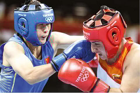 Pooja Rani (in red) in action